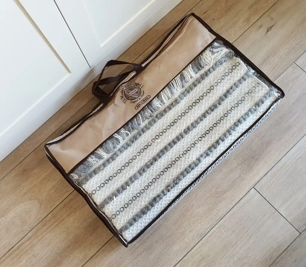 handwoven chunky wool throw blanket in natural color, showcasing traditional weaving texture and premium quality materials.