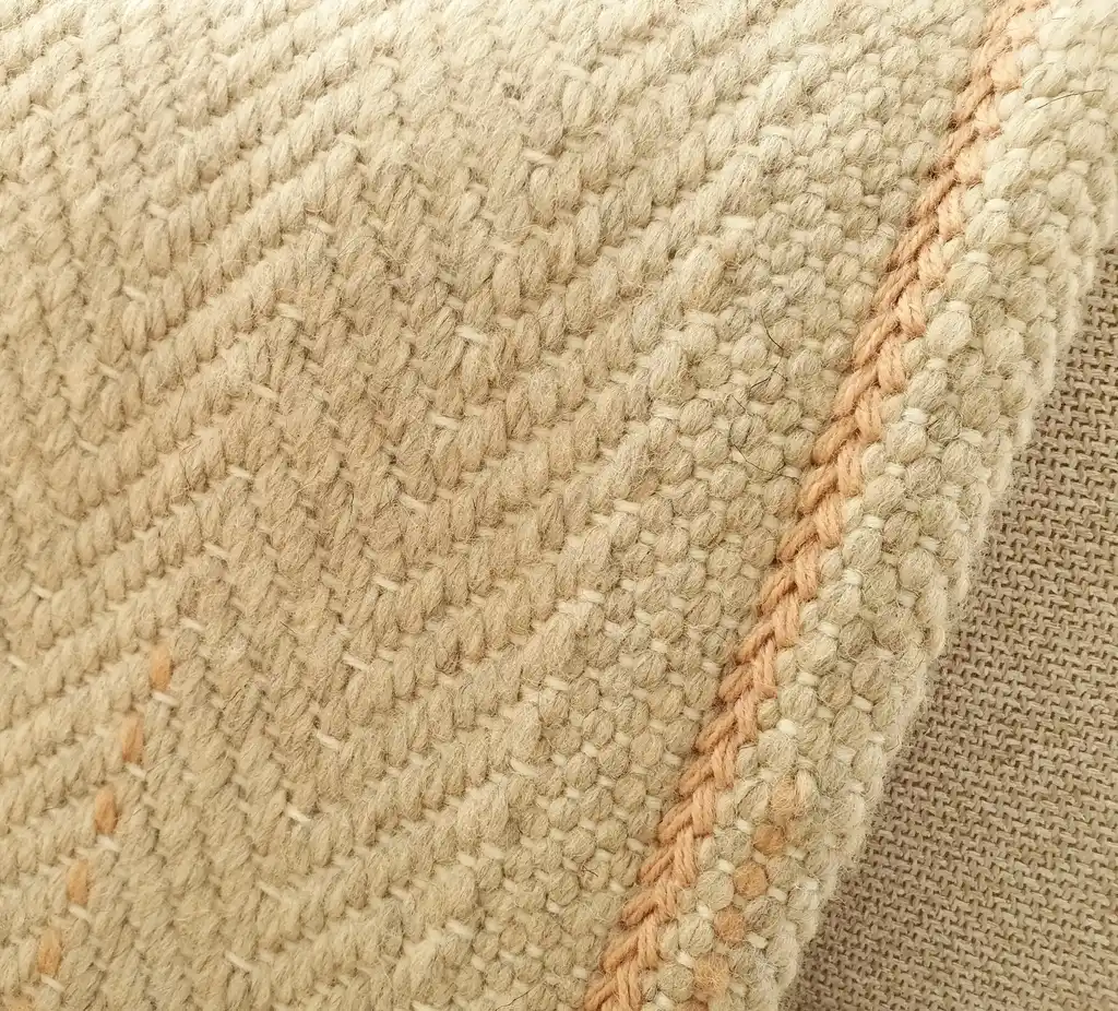 handwoven merino wool throw blanket in natural texture, luxury home textile.