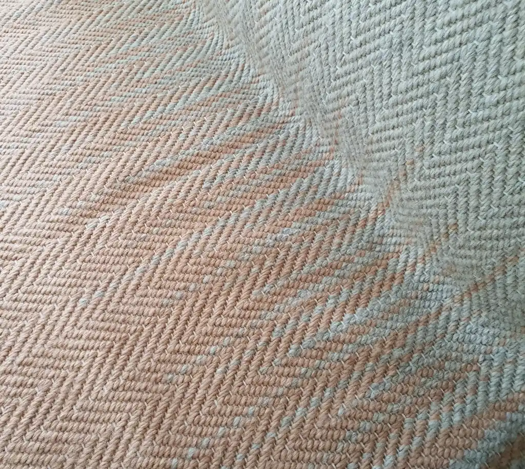handwoven merino wool throw blanket in natural texture, luxury home textile.