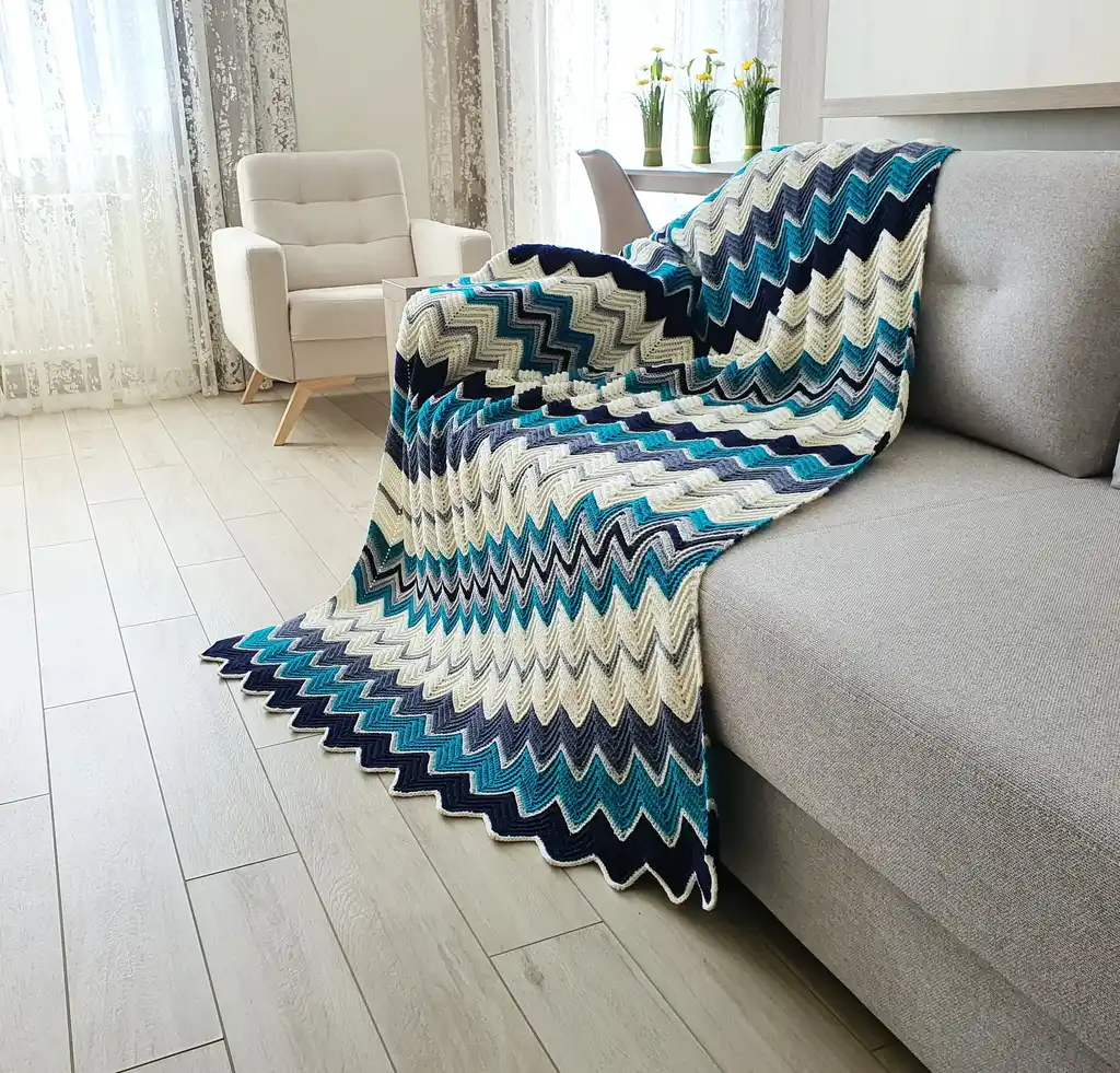 handmade Crochet throw blanket in blended wool, machine washable home textile.