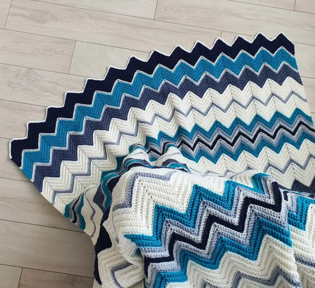 handmade Crochet throw blanket in blended wool, machine washable home textile.