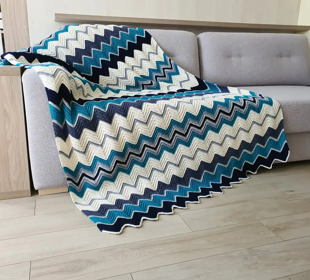handmade Crochet throw blanket in blended wool, machine washable home textile.