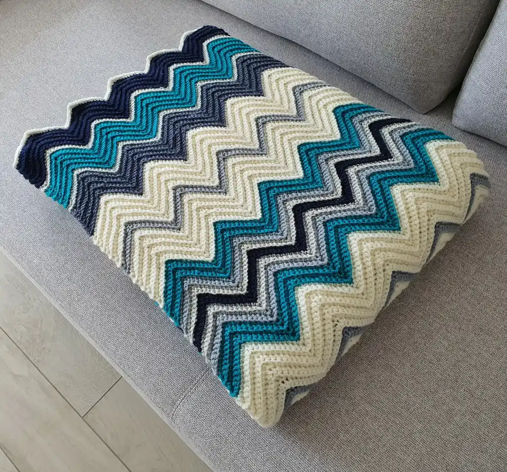 handmade Crochet throw blanket in blended wool, machine washable home textile.