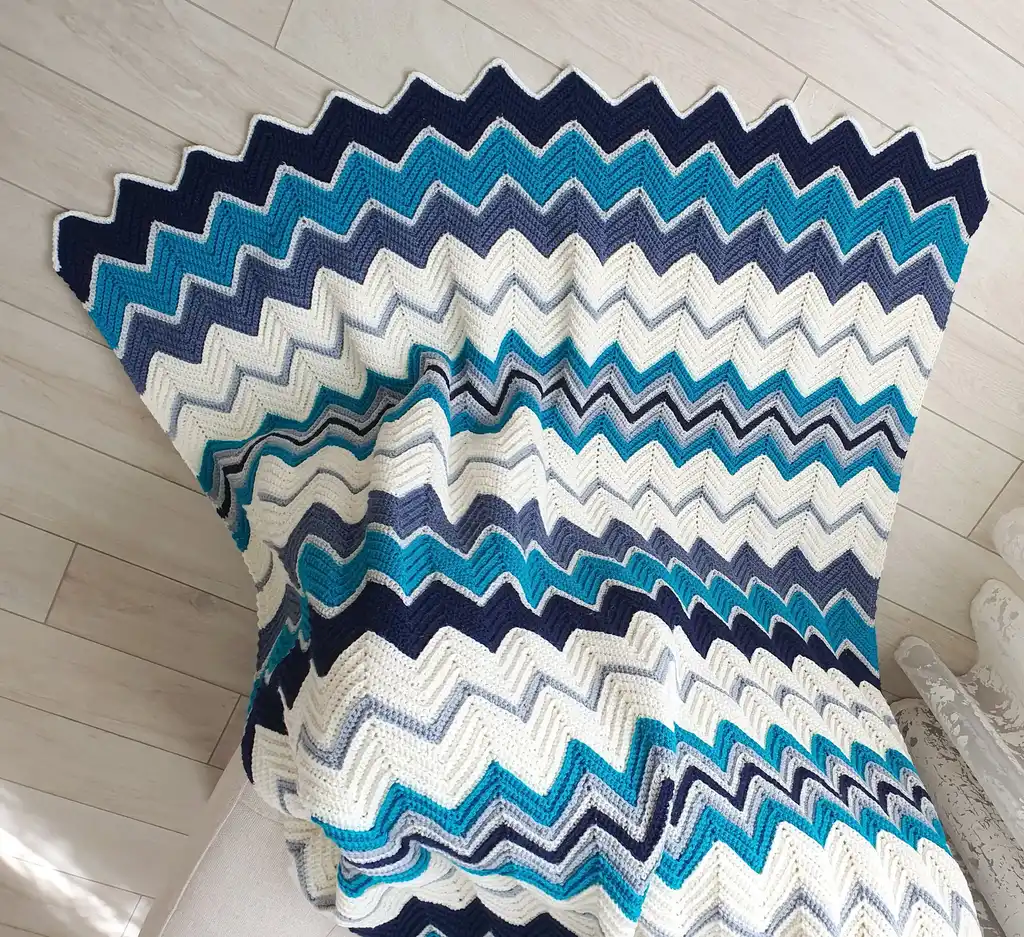 handmade Crochet throw blanket in blended wool, machine washable home textile.