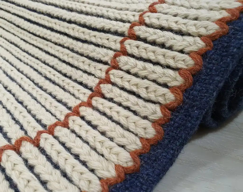 handwoven wool rug with traditional Ukrainian weaving pattern.