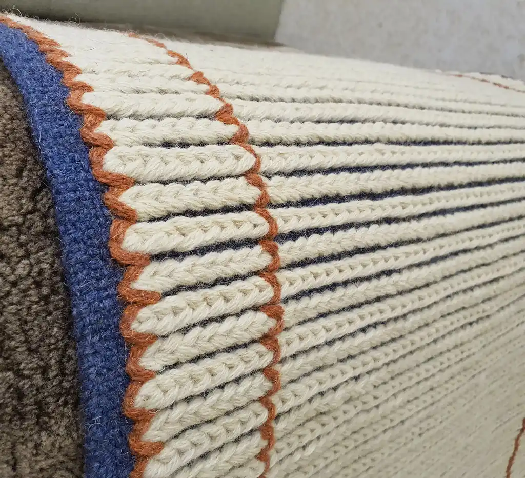 handwoven wool rug with traditional Ukrainian weaving pattern.