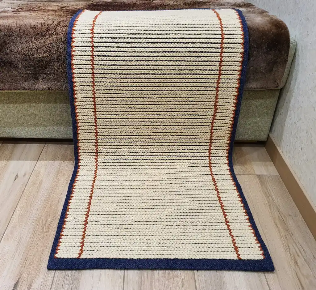 handwoven wool rug with traditional Ukrainian weaving pattern.