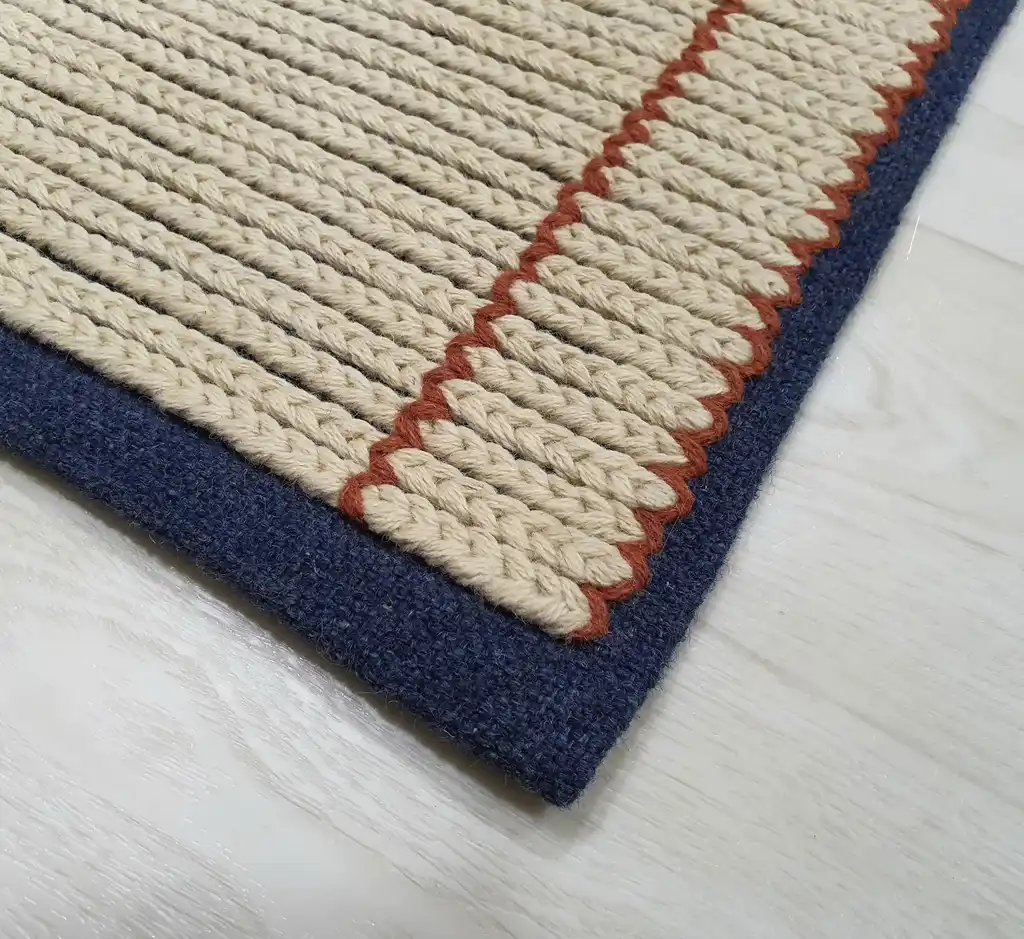handwoven wool rug with traditional Ukrainian weaving pattern.