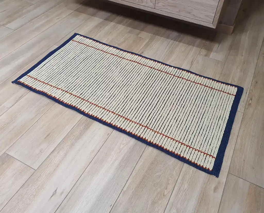 handwoven wool rug with traditional Ukrainian weaving pattern.