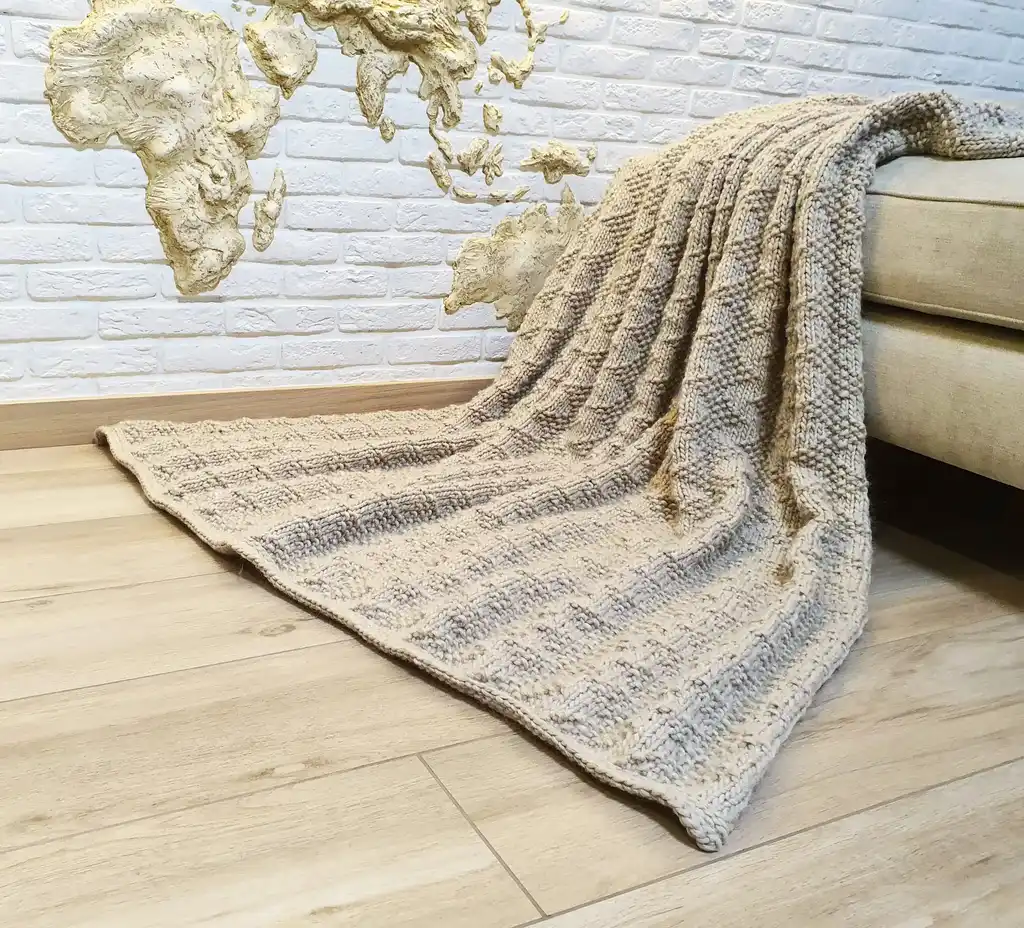 luxury merino wool knitted throw blanket for home decor.