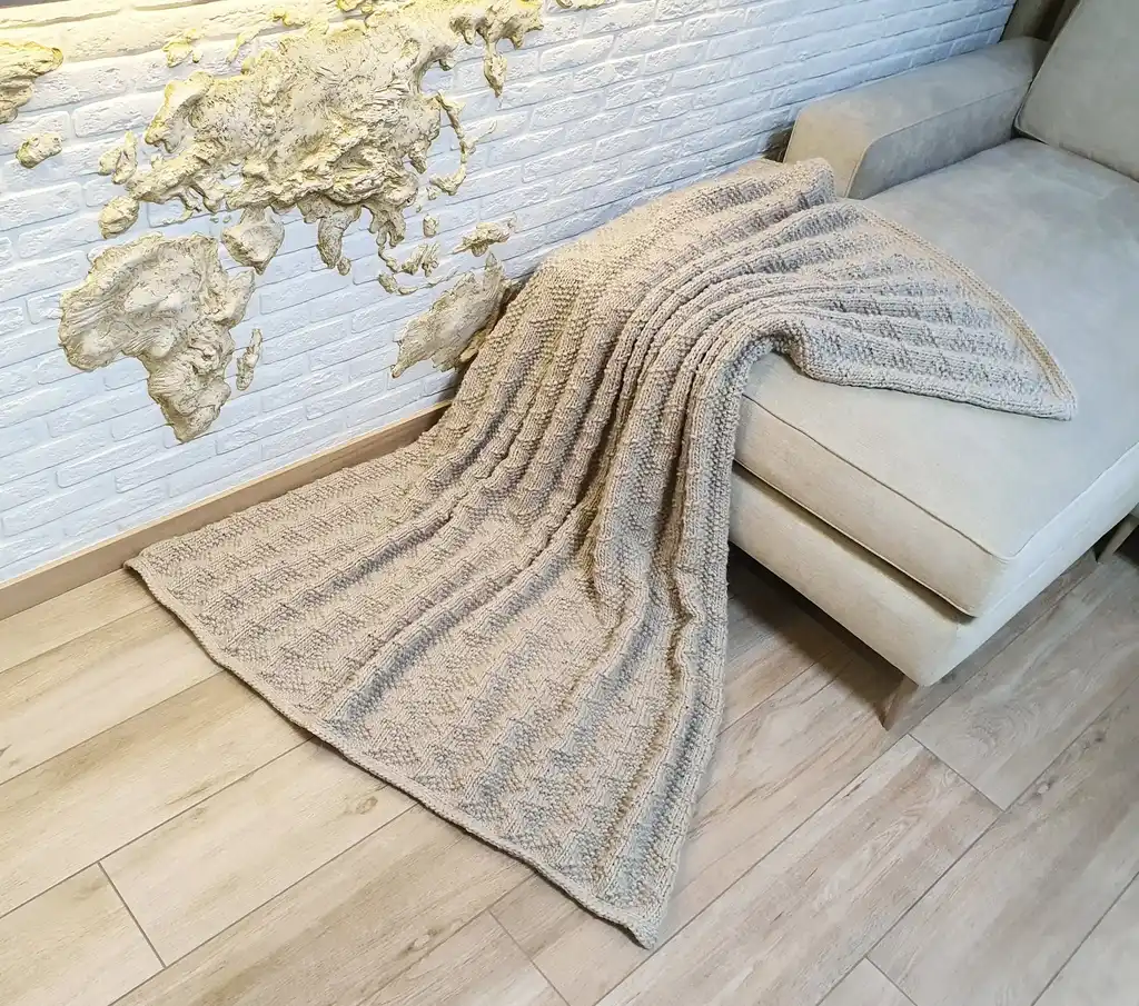 luxury merino wool knitted throw blanket for home decor.