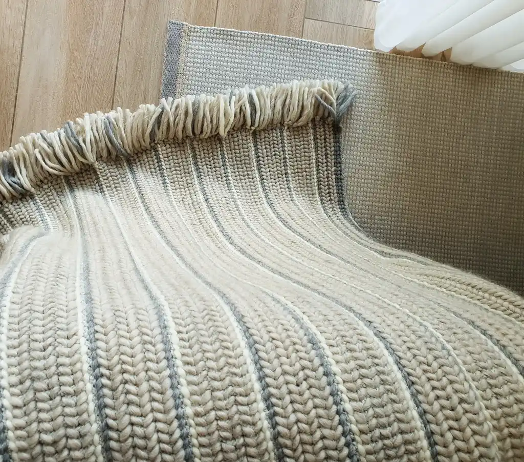 luxury crochet throw blanket made from merino wool.