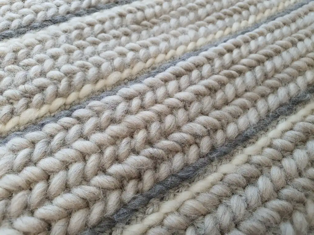 luxury crochet throw blanket made from merino wool.