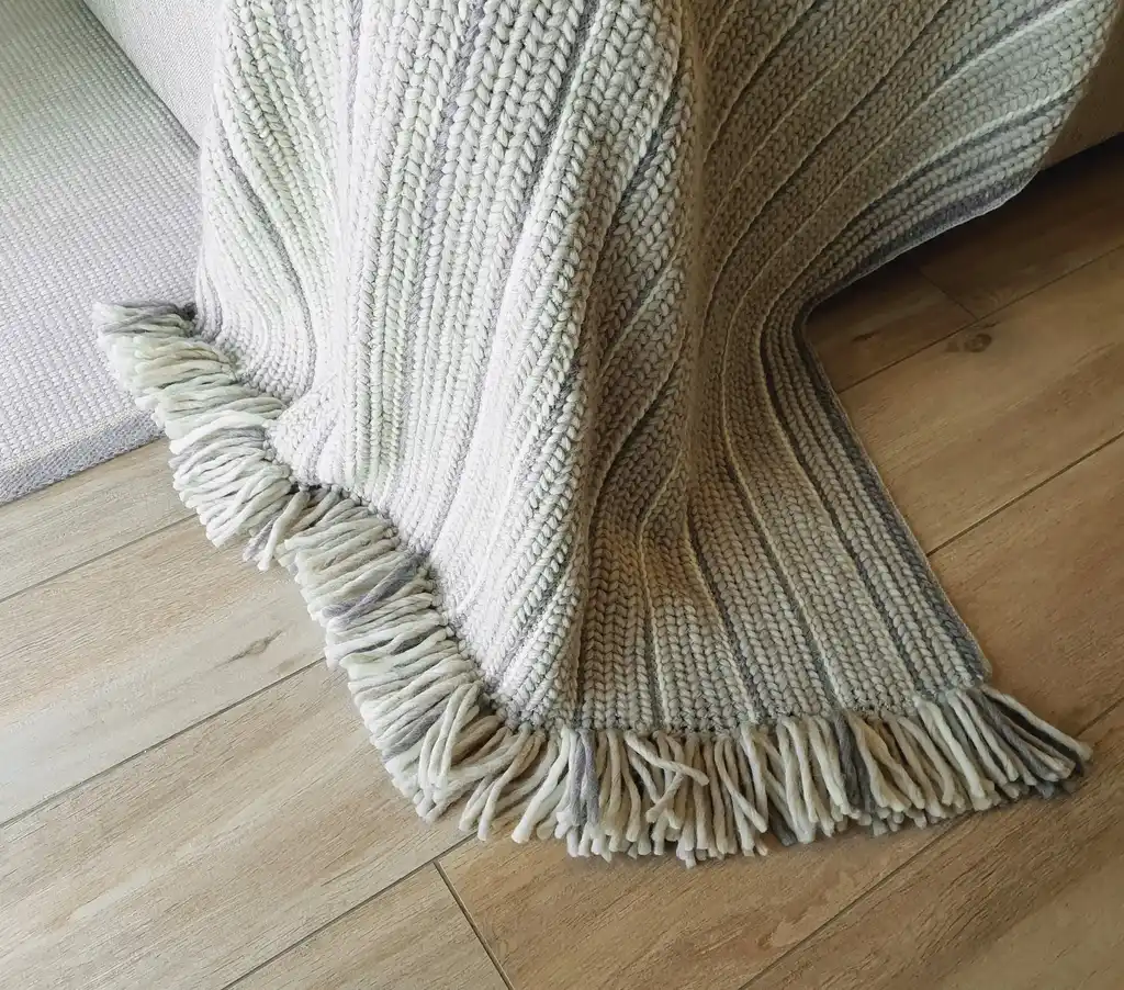 luxury crochet throw blanket made from merino wool.
