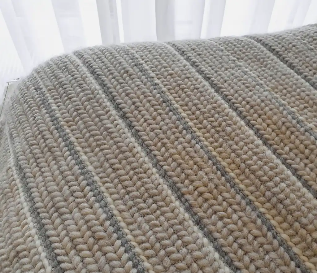 luxury crochet throw blanket made from merino wool.
