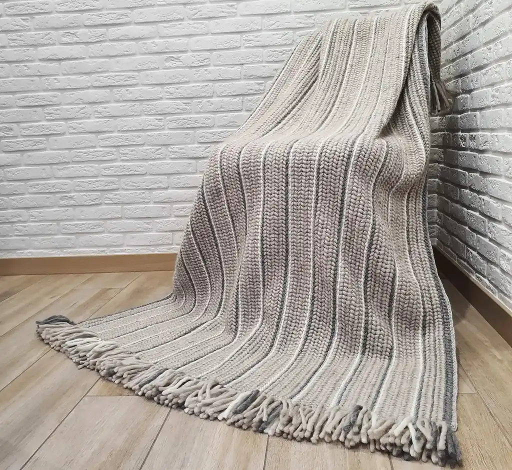 luxury crochet throw blanket made from merino wool.