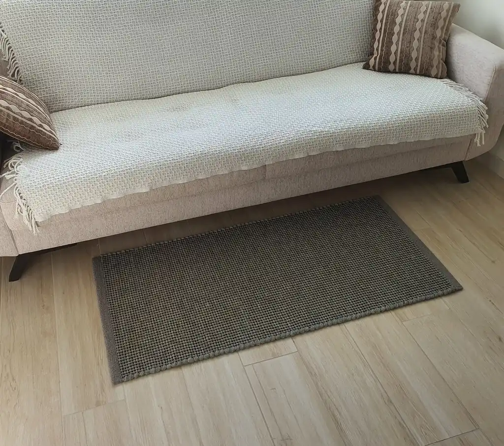handwoven chunky wool rug with traditional weaving pattern.