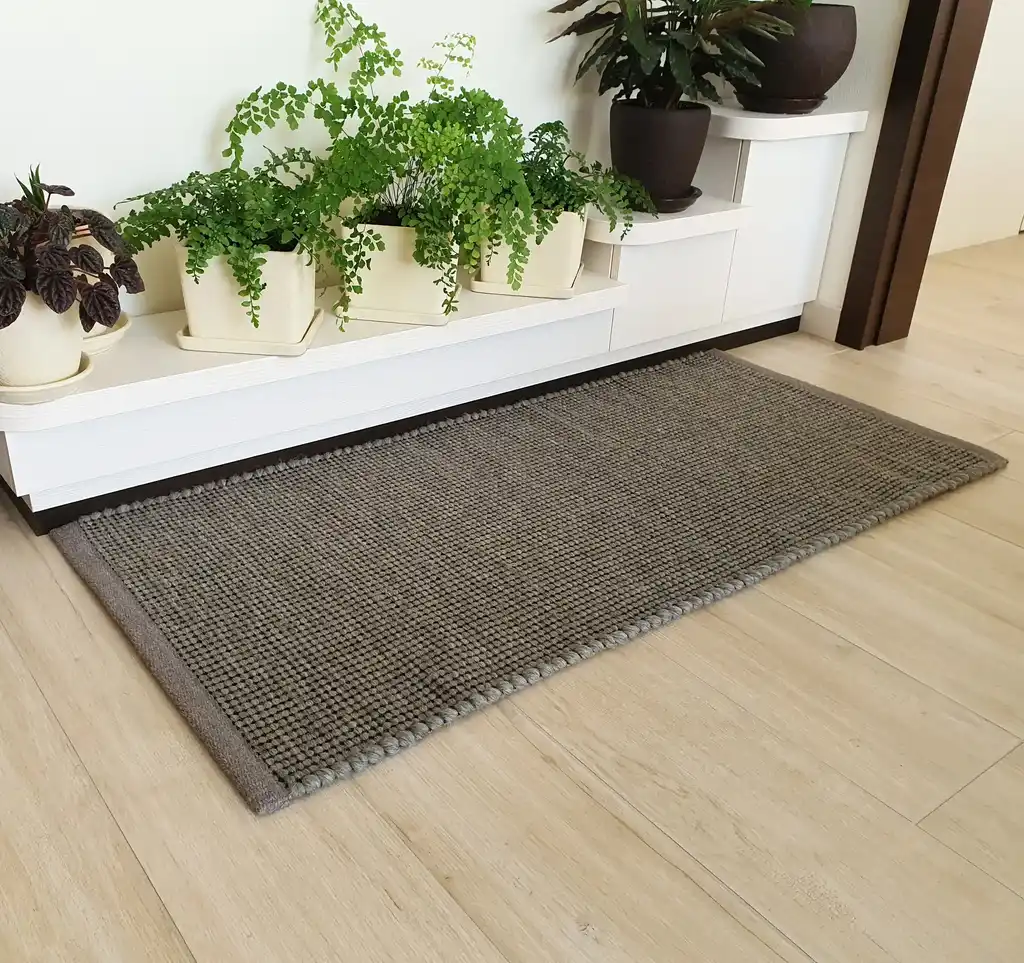 handwoven chunky wool rug with traditional weaving pattern.