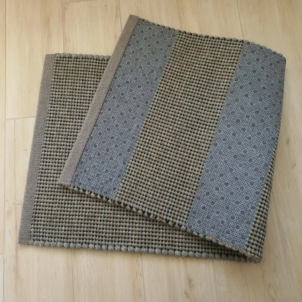 handwoven chunky wool rug with traditional weaving pattern.