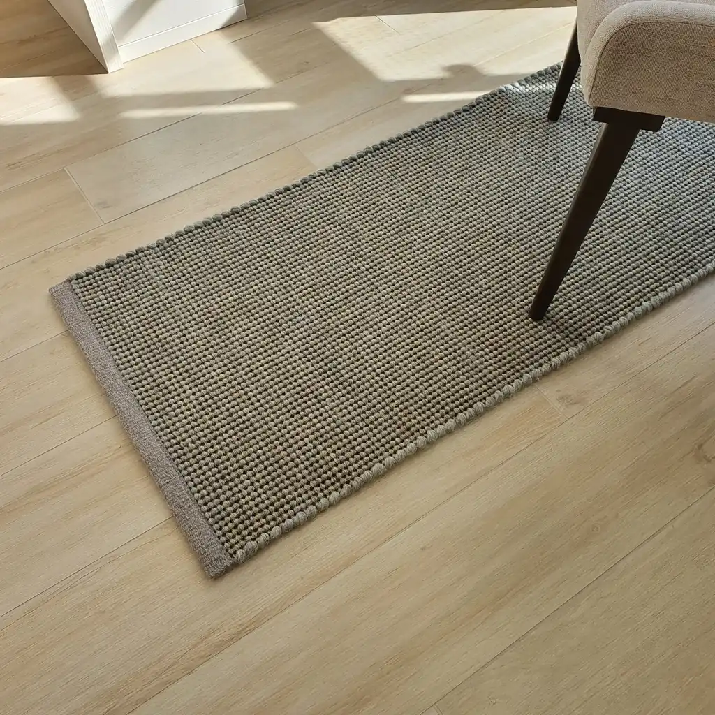 handwoven chunky wool rug with traditional weaving pattern.