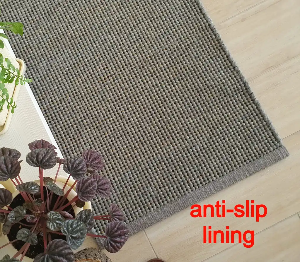 handwoven chunky wool rug with traditional weaving pattern.