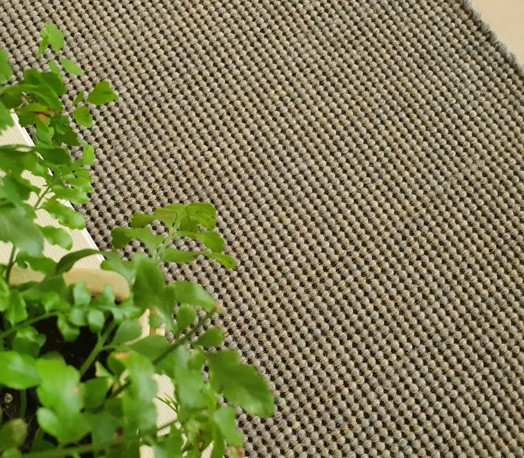 handwoven chunky wool rug with traditional weaving pattern.