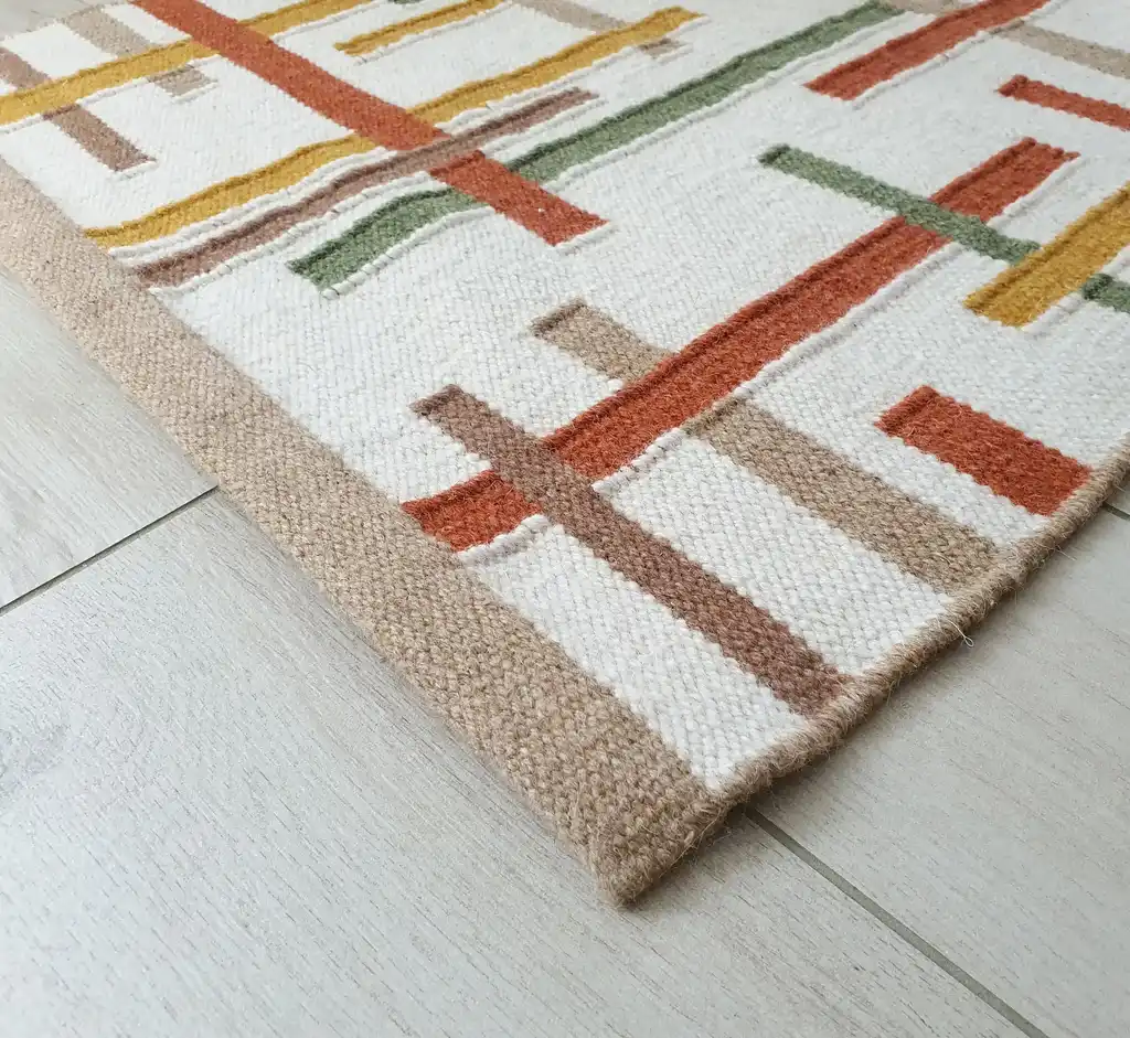 handwoven wool rug with traditional Ukrainian patterns in natural colors.