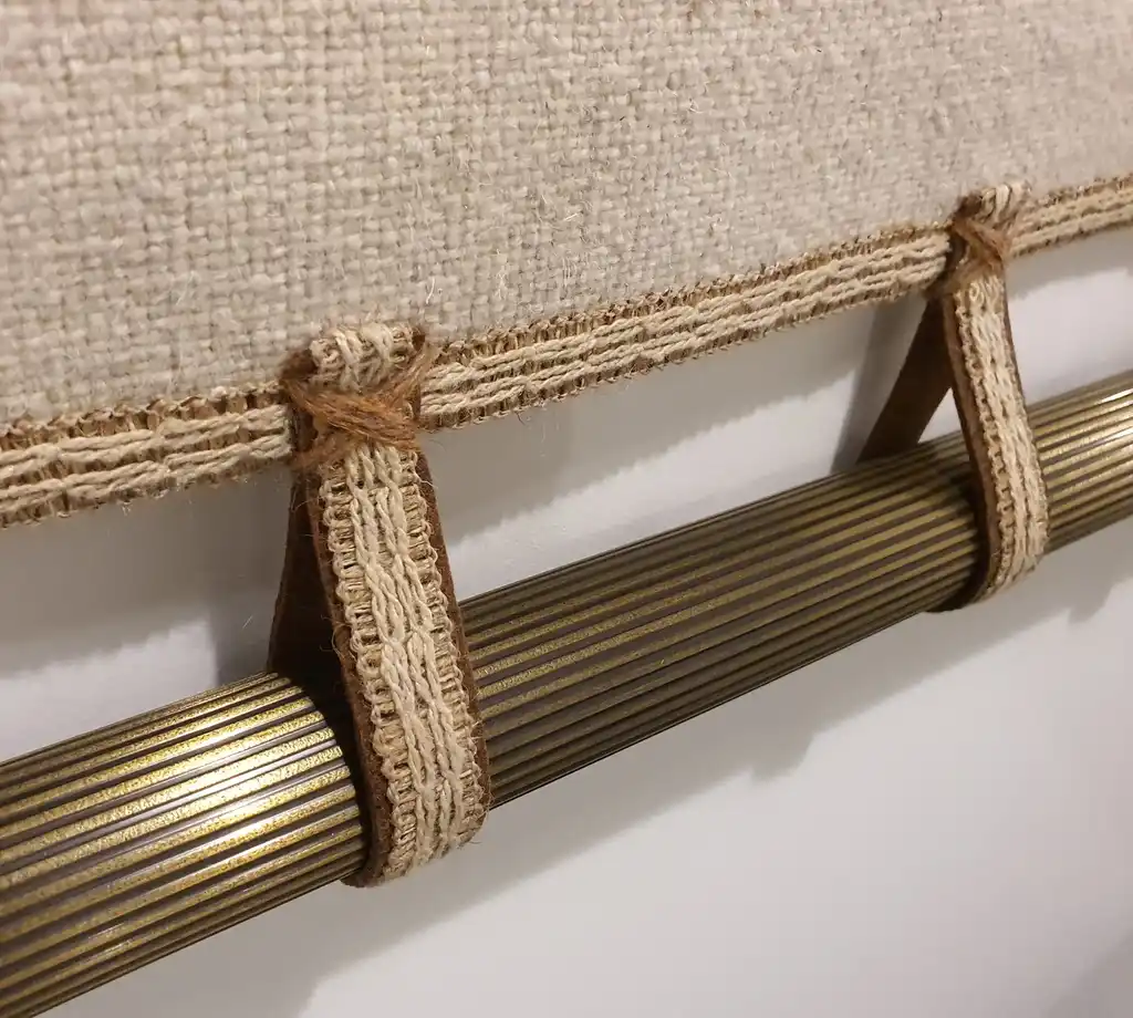 handwoven wool wall hanging with traditional weaving patterns.