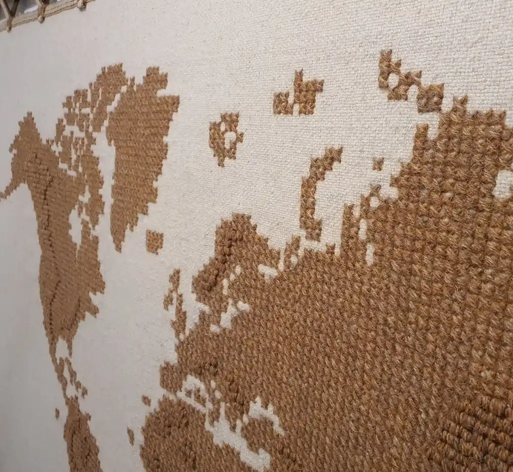 handwoven wool wall hanging with traditional weaving patterns.