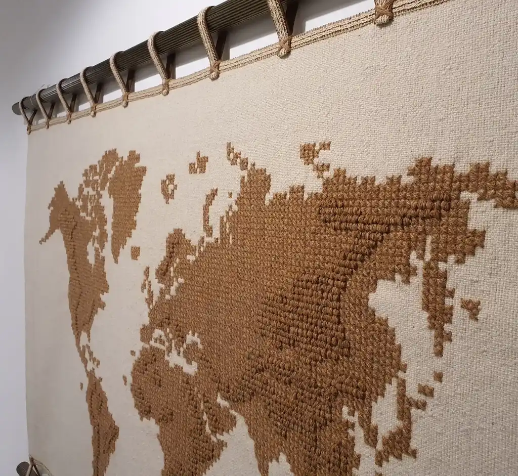 handwoven wool wall hanging with traditional weaving patterns.