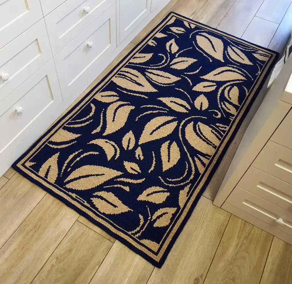traditional Ukrainian cross-stitch wool rug with geometric patterns in earth tones.