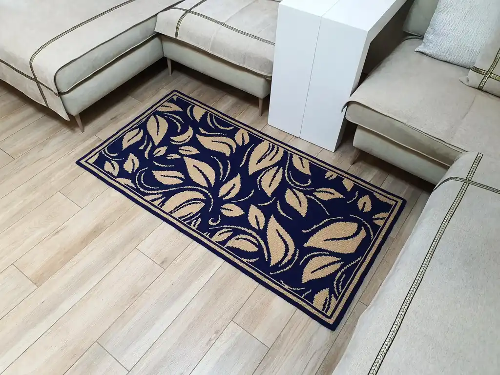 traditional Ukrainian cross-stitch wool rug with geometric patterns in earth tones.