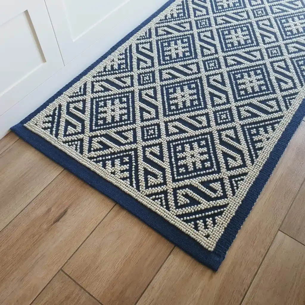 handwoven wool rug featuring traditional Ukrainian weaving techniques.