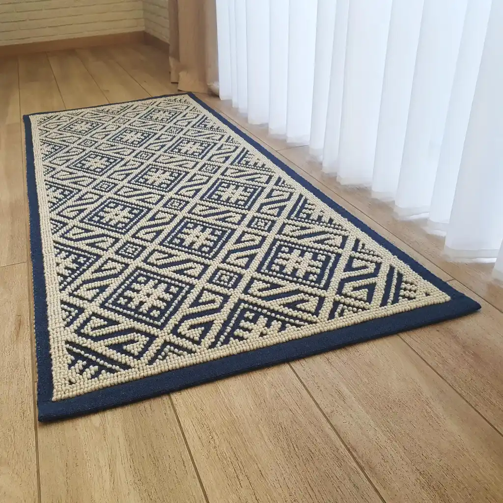handwoven wool rug featuring traditional Ukrainian weaving techniques.