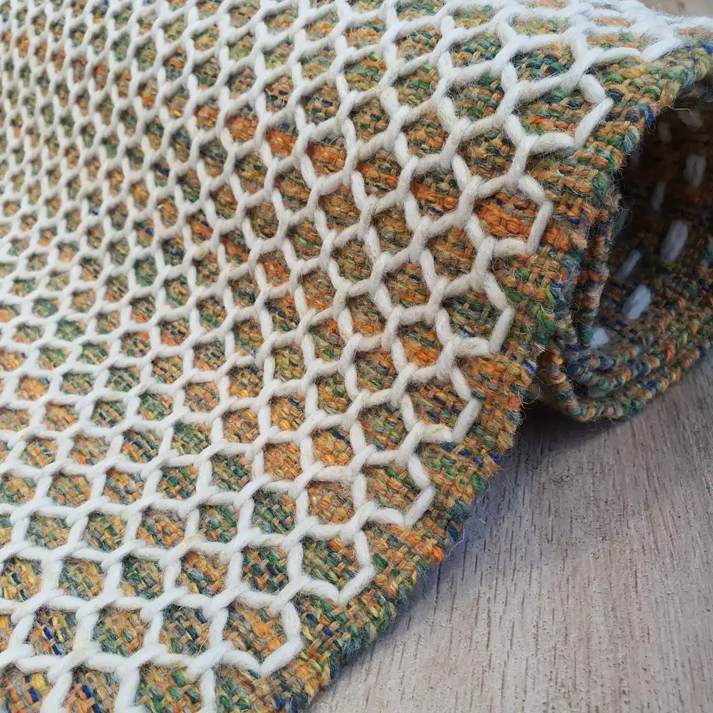 handwoven wool rug traditional weaving technique.