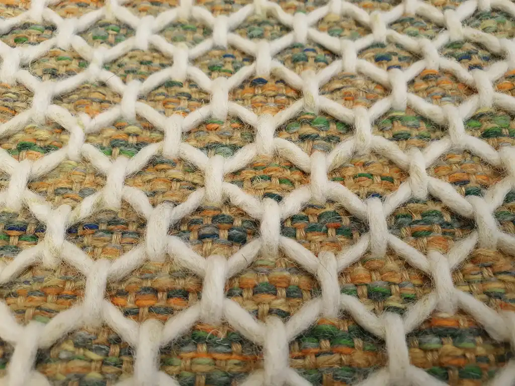 handwoven wool rug traditional weaving technique.