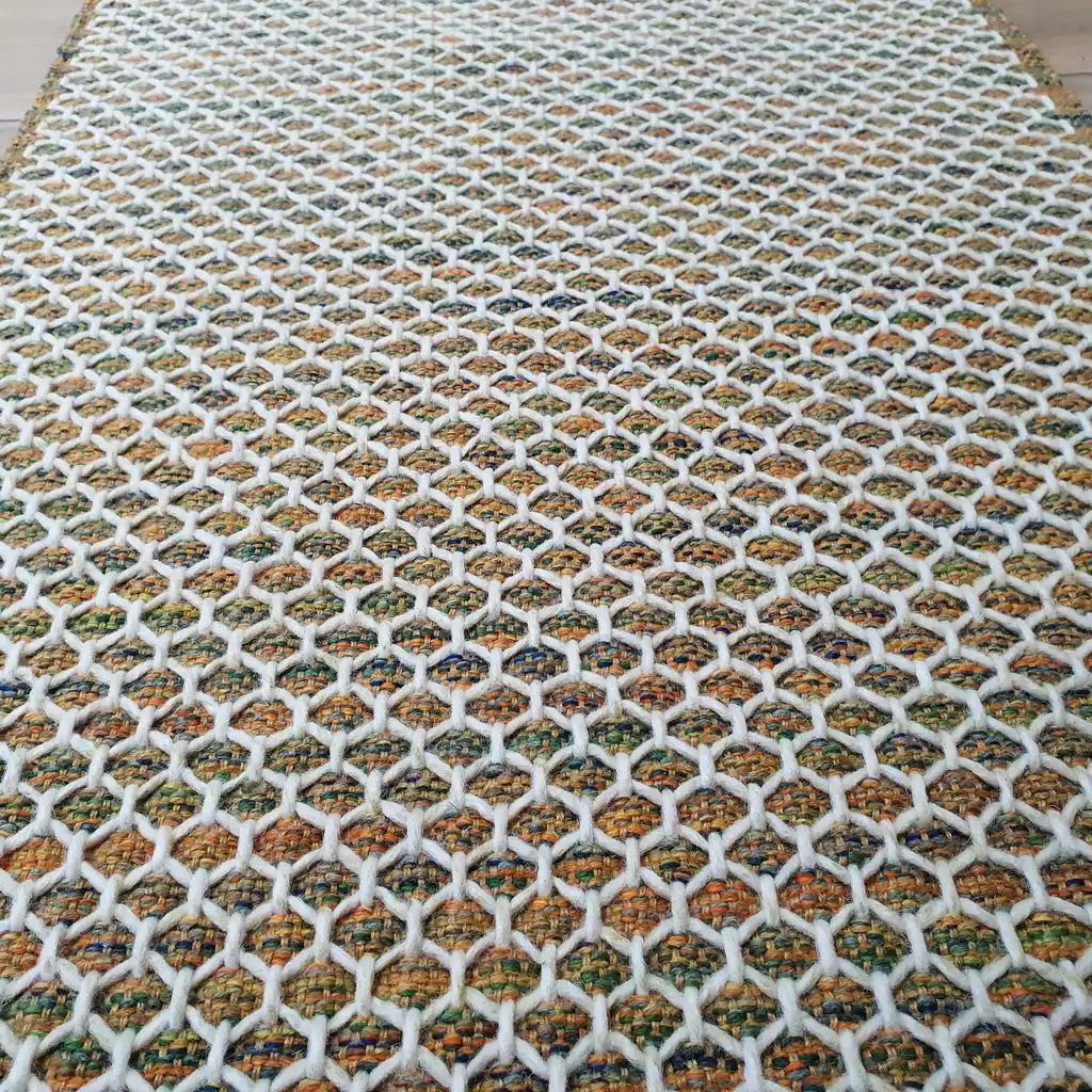 handwoven wool rug traditional weaving technique.