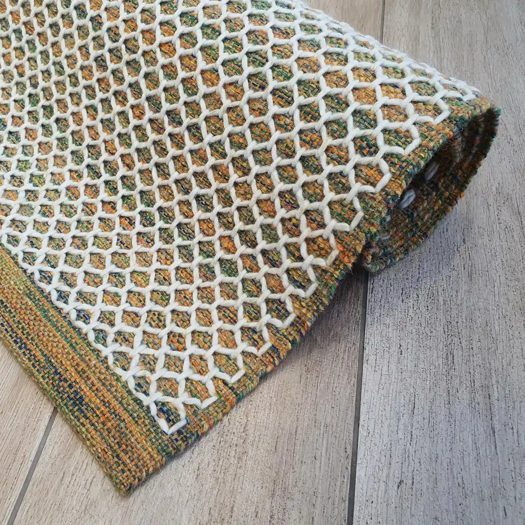 handwoven wool rug traditional weaving technique.