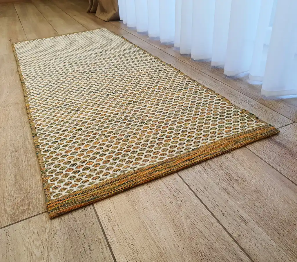 handwoven wool rug traditional weaving technique.