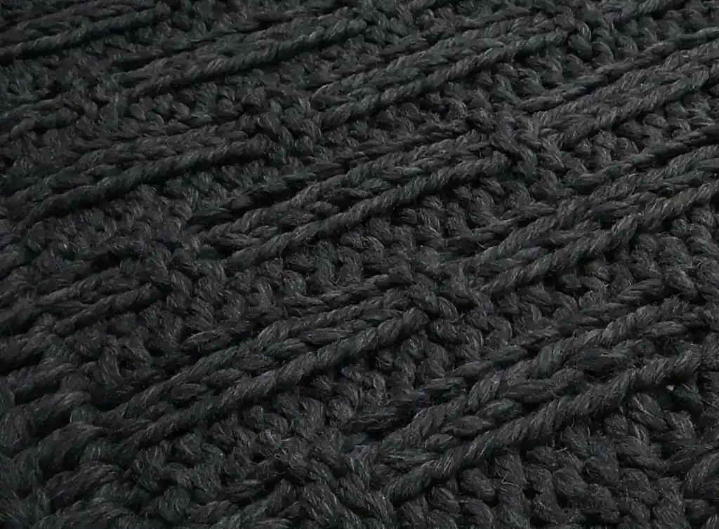 chunky wool knitted blanket in neutral color, handcrafted throw for home comfort.