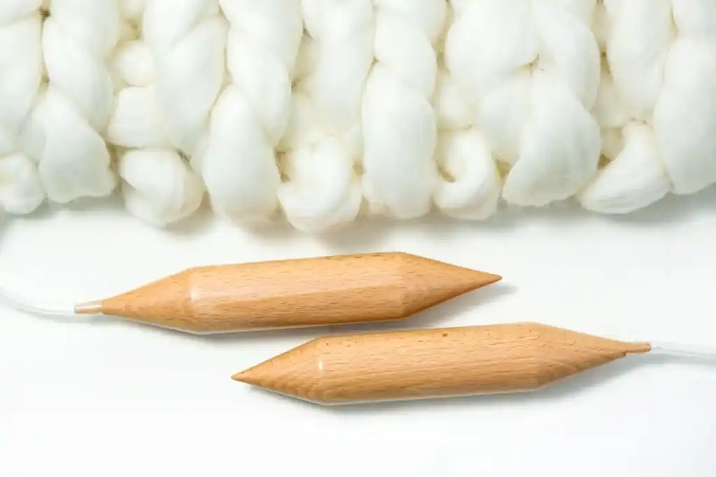 premium beech wood knitting needles 35mm diameter for chunky yarn crafting.