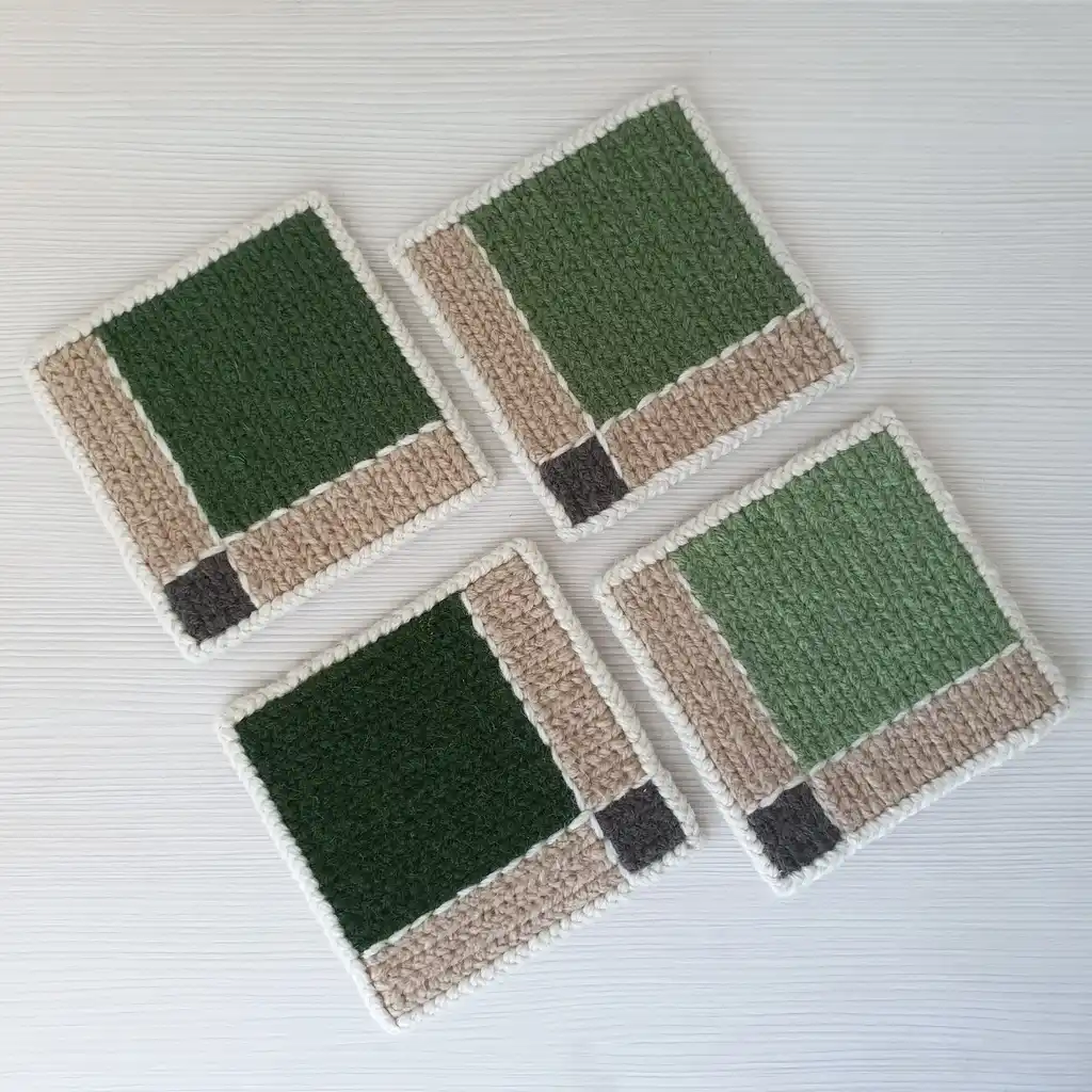 Handmade set of 4 jute embroidered pads with non-slip backing.