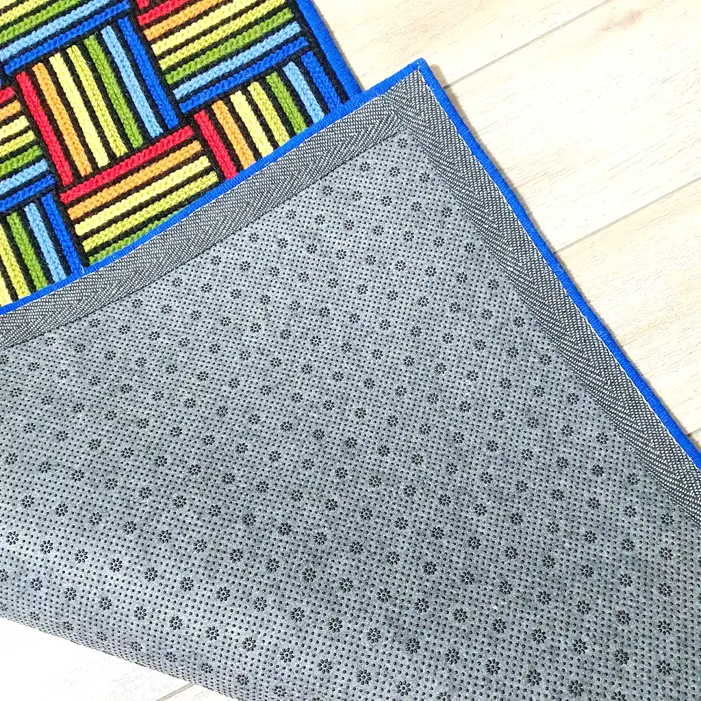 Modern rainbow geometric pattern rug with anti-slip lining.