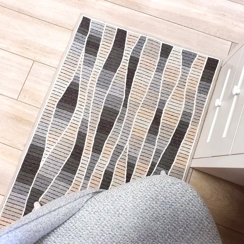 Handmade cross-stitch wool rug with wavy gray and beige stripes, thick plush lining, perfect for living room or bedroom