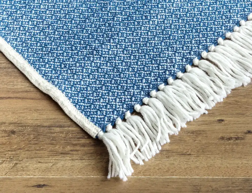 premium merino wool woven throw blanket in neutral colors.