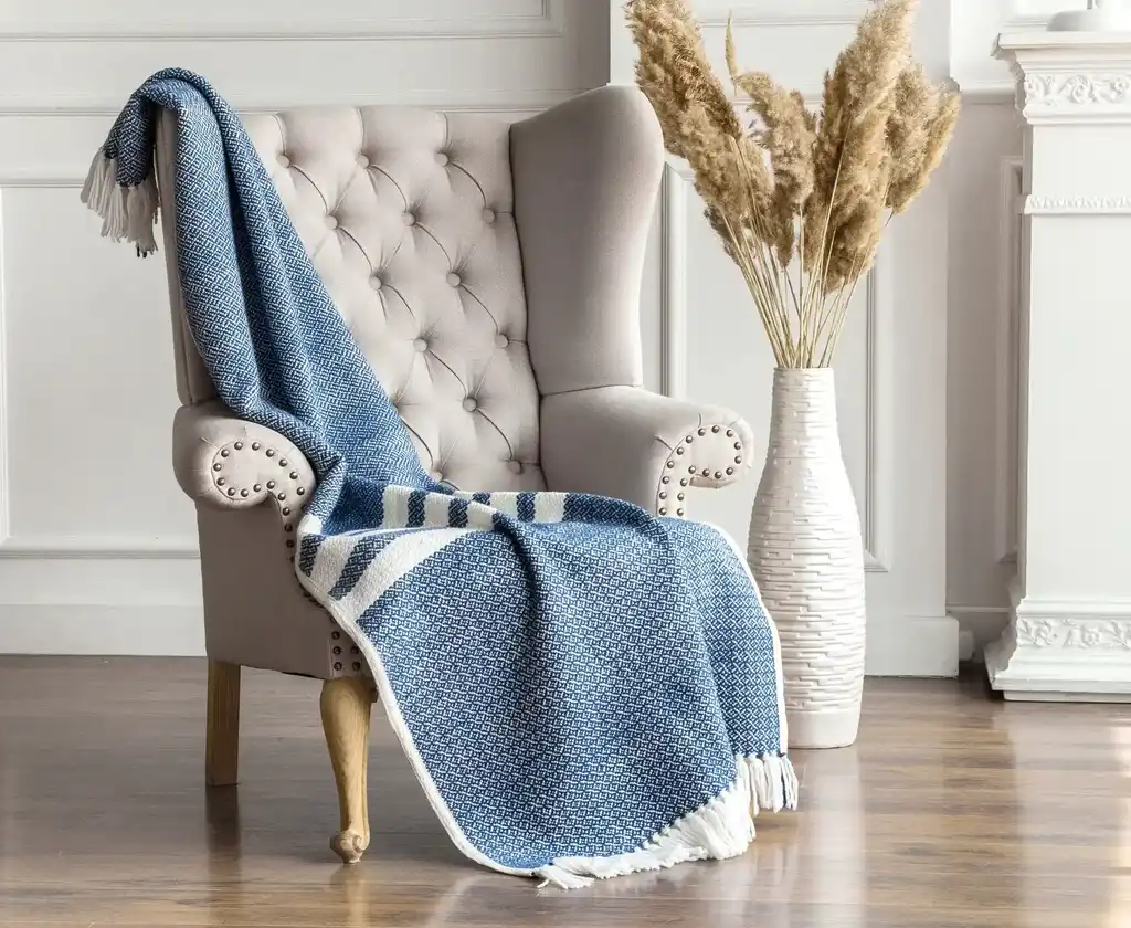 premium merino wool woven throw blanket in neutral colors.