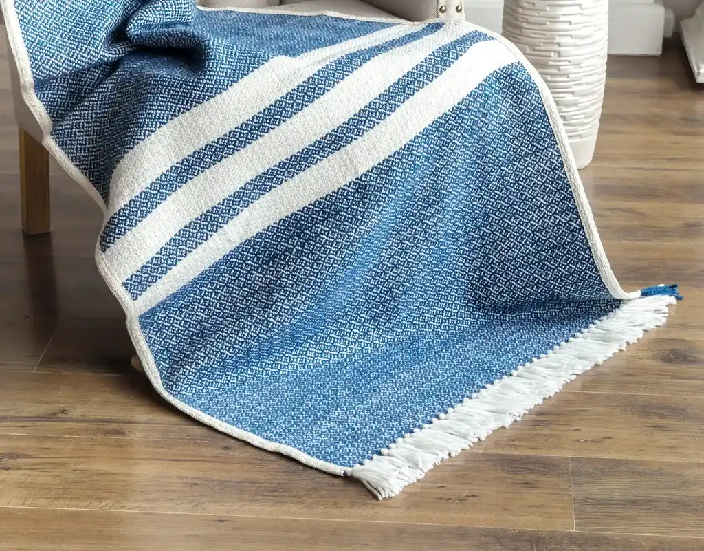 premium merino wool woven throw blanket in neutral colors.