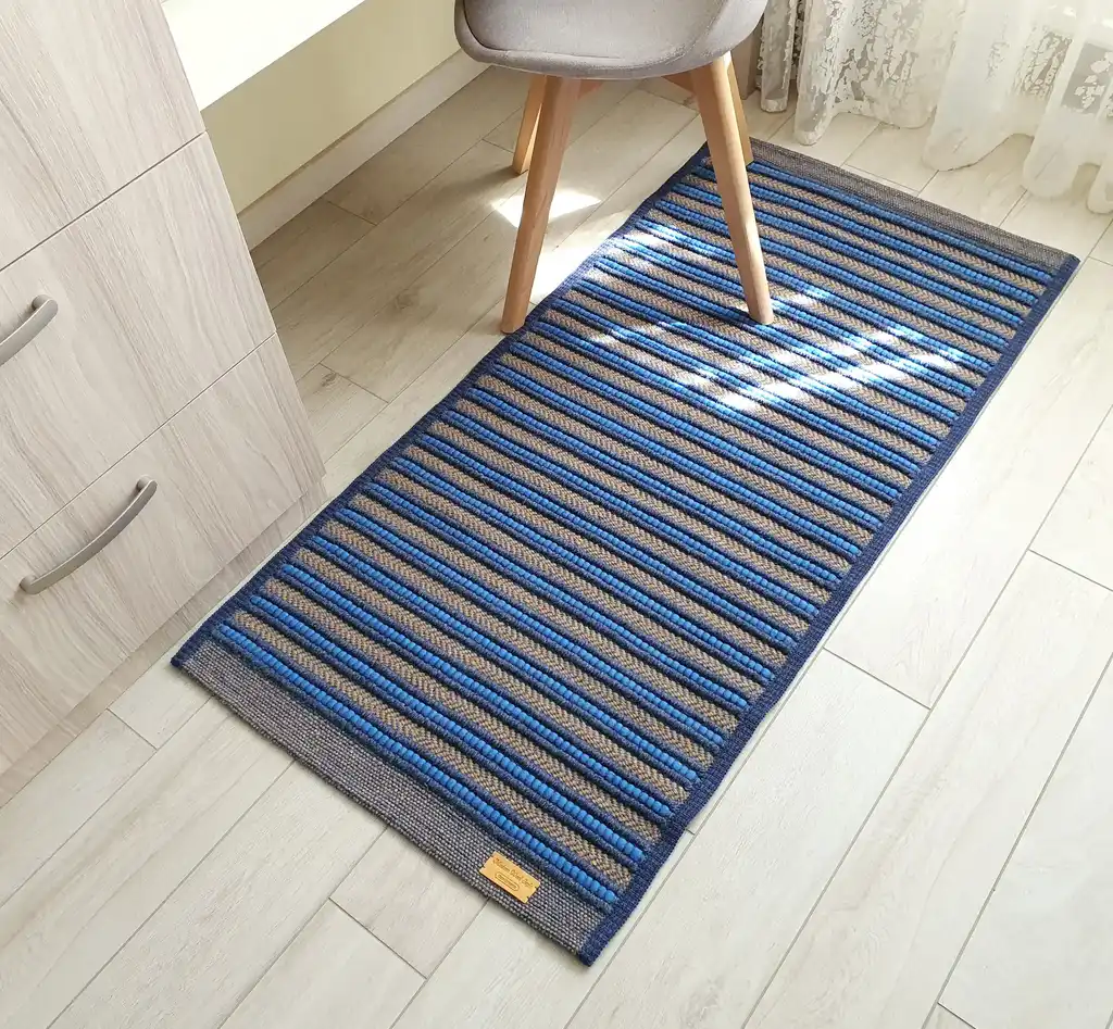 handwoven rug made from natural jute and chunky wool fibers.