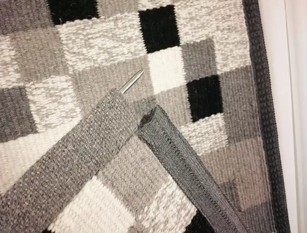 handwoven wool wall hanging textile art piece.