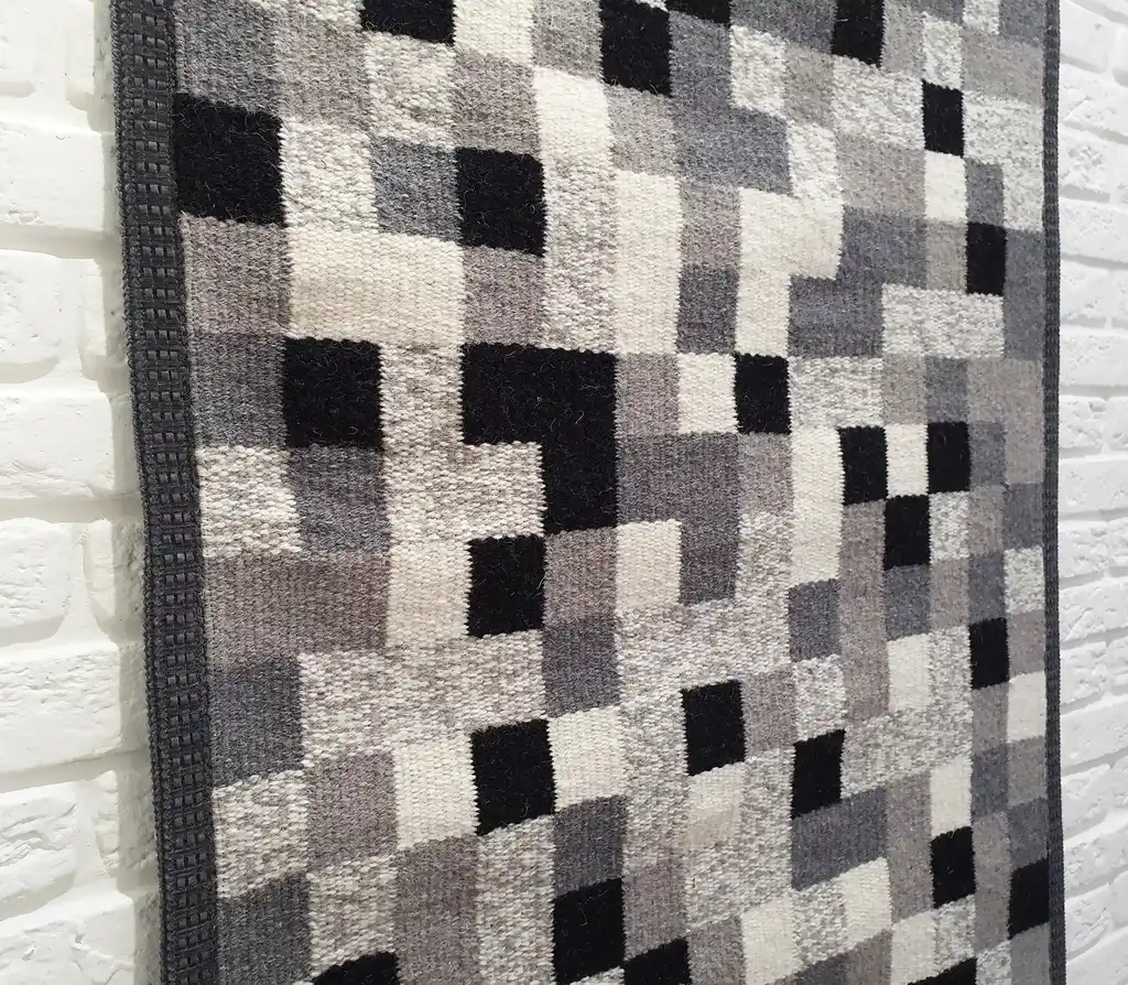 handwoven wool wall hanging textile art piece.